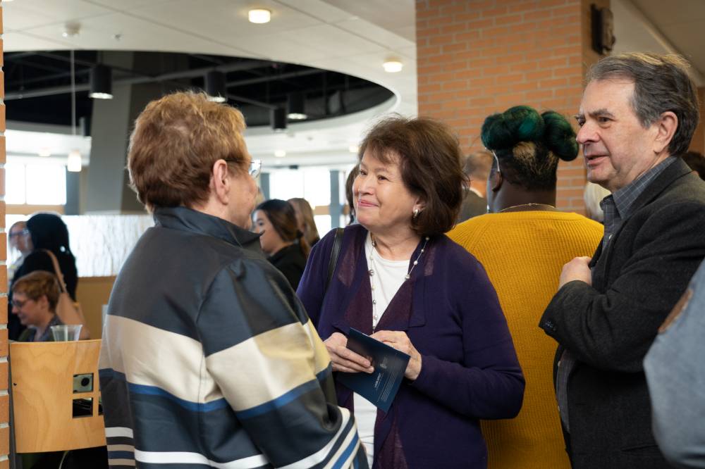 Lynn Blue greeting guests at the Lynn M. Blue Connection Naming Ceremony